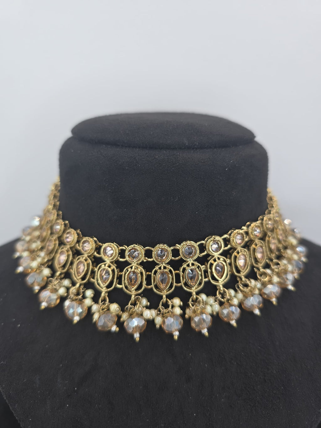 Indian polki champagne 2 line set with earings & tikka