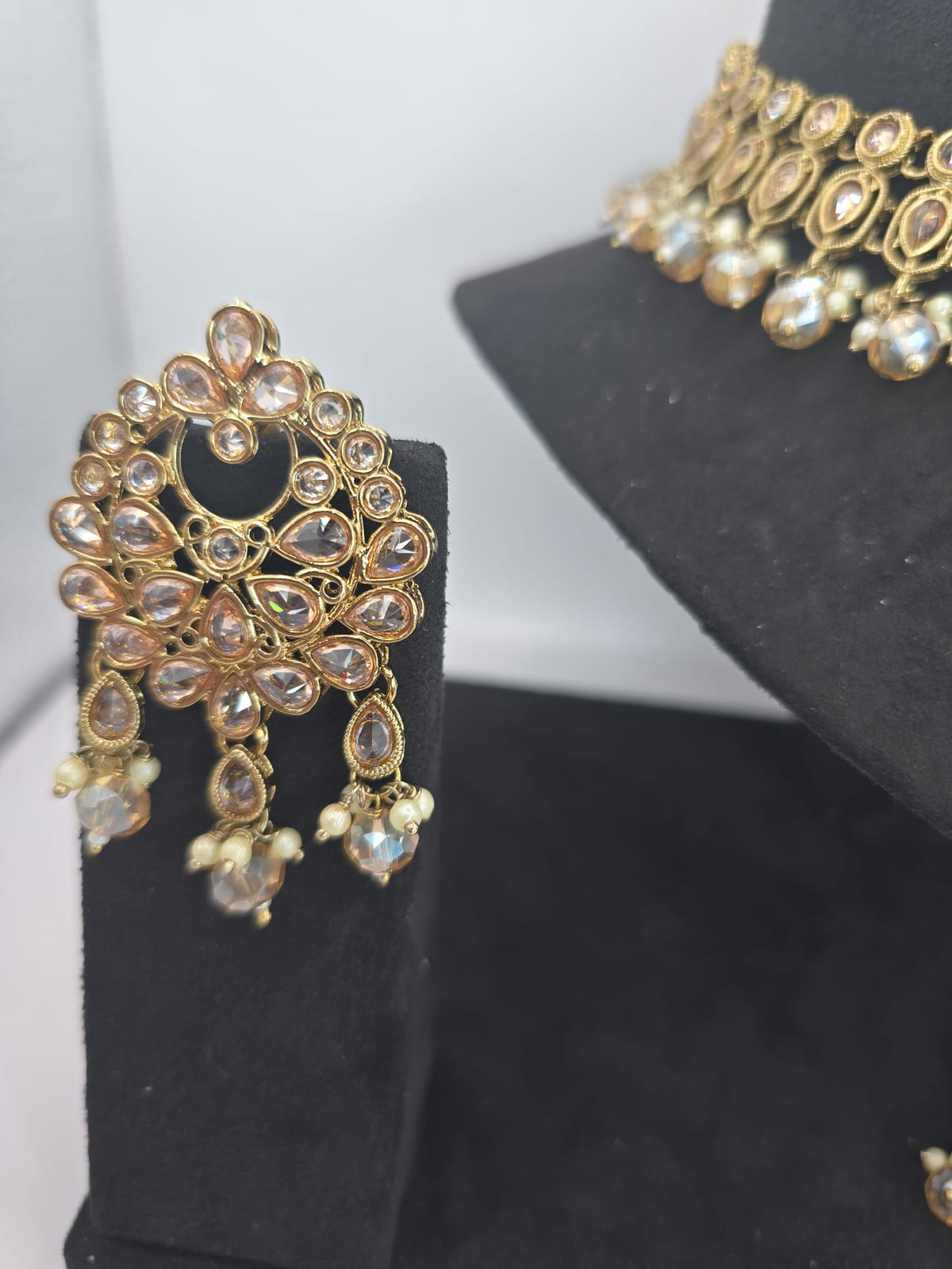 Indian polki champagne 2 line set with earings & tikka