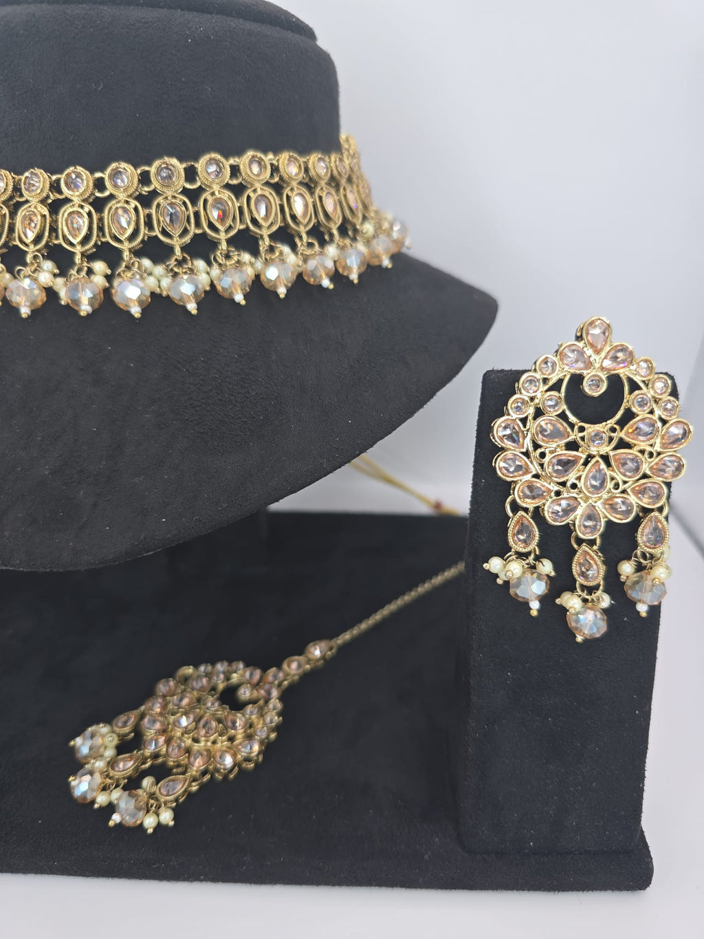 Indian polki champagne 2 line set with earings & tikka