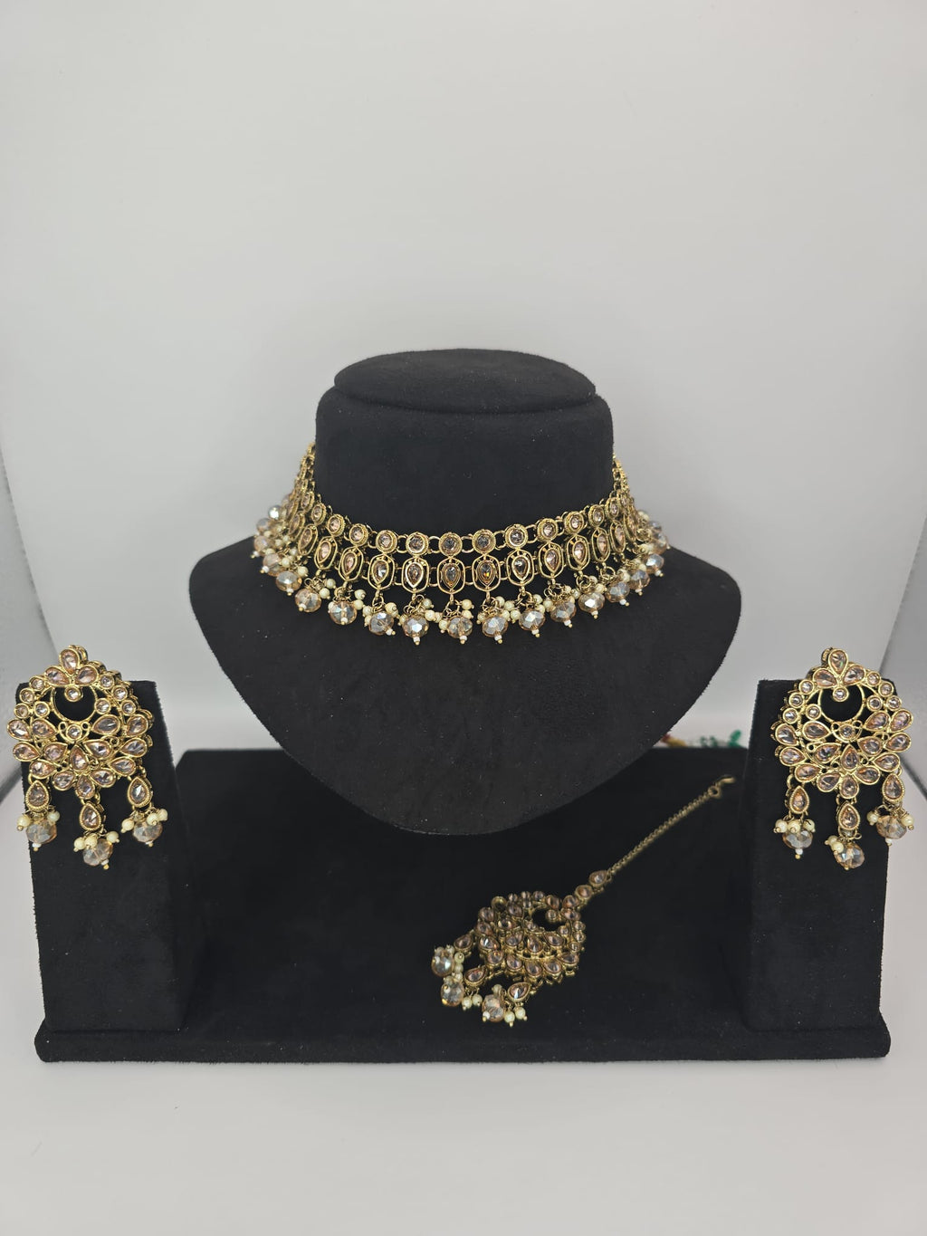 Indian polki champagne 2 line set with earings & tikka