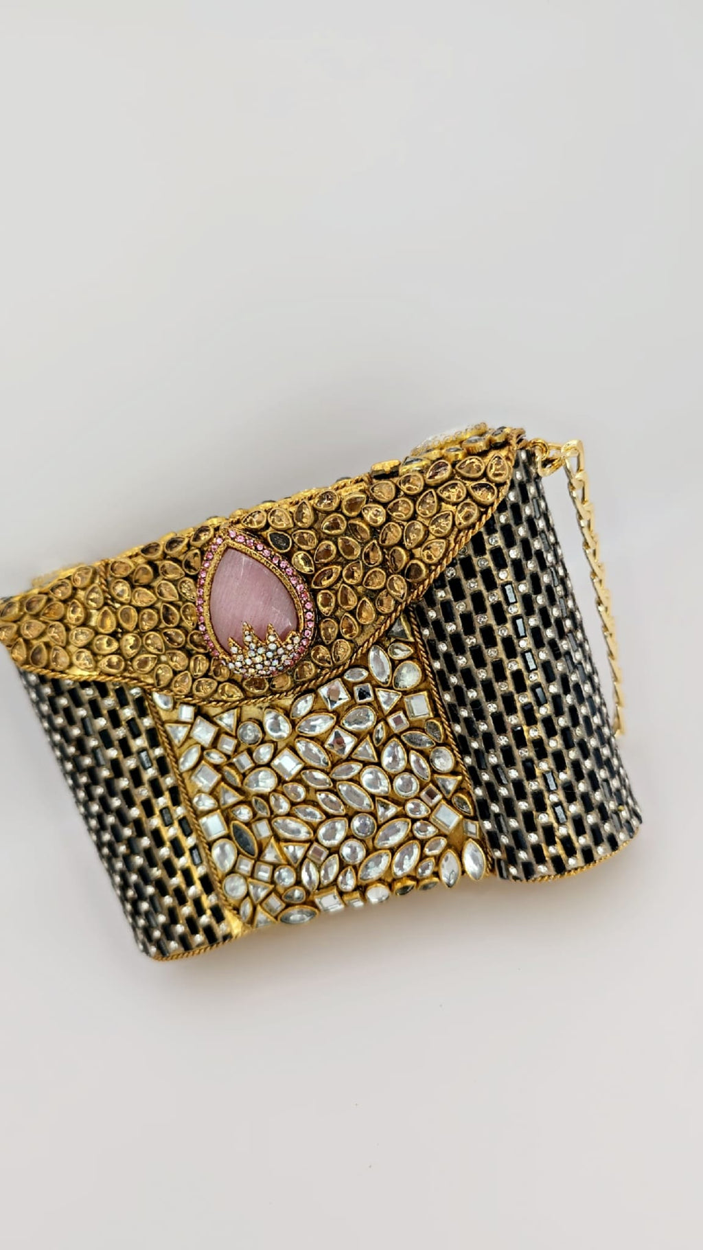 black/pink kundan inspired clutch