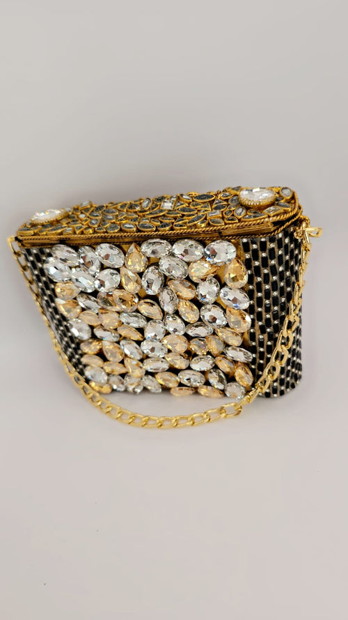 black/pink kundan inspired clutch