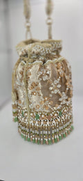 valvet beige potli bag