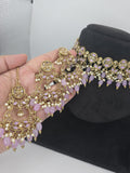 lilac choker with earings and tikka