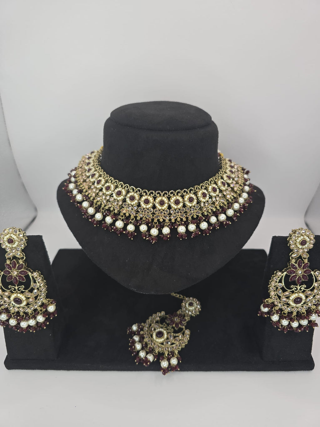 deep mehroon polki semi bridal set with tikka