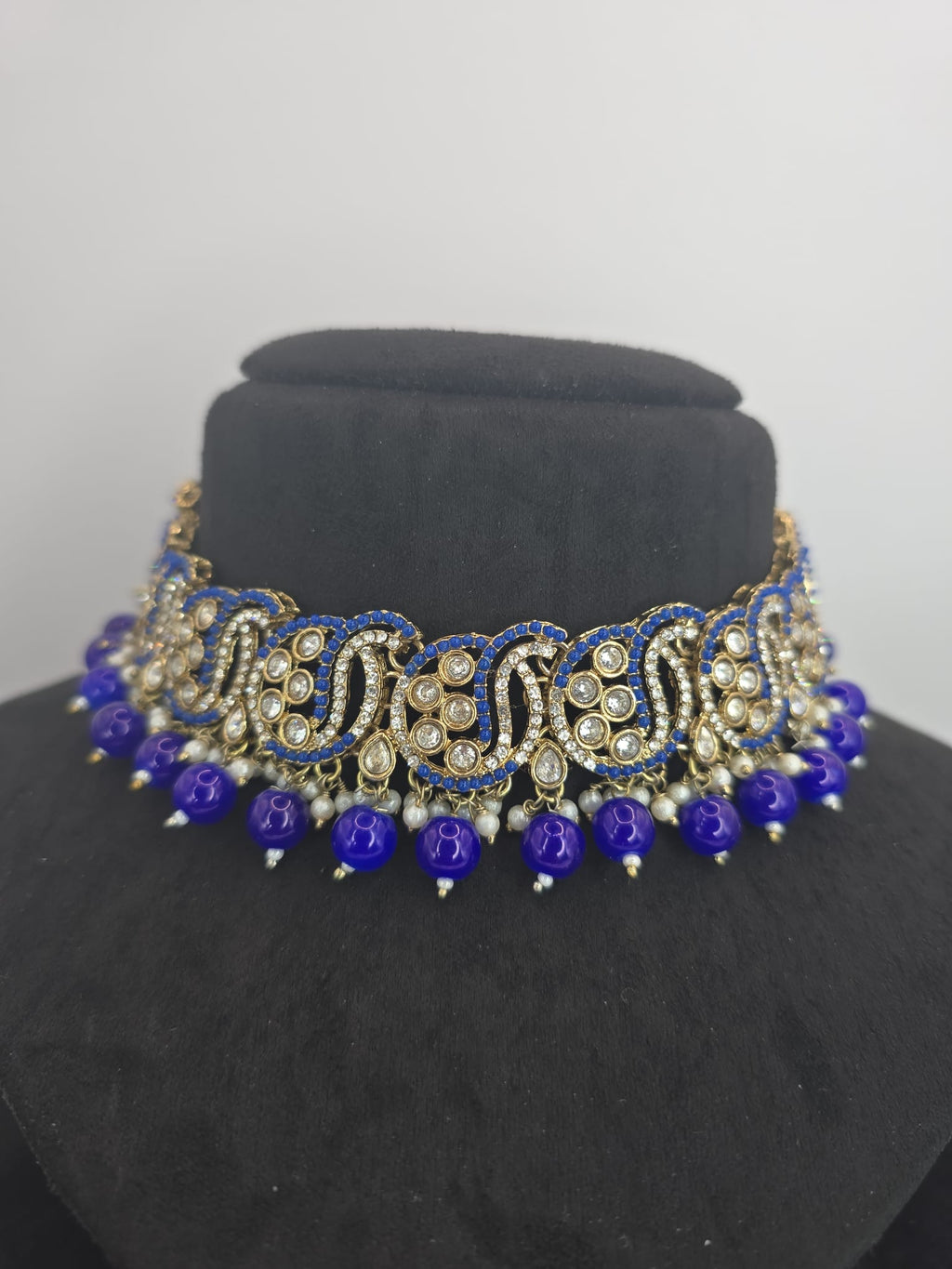 blue choker set with big earings and tikka