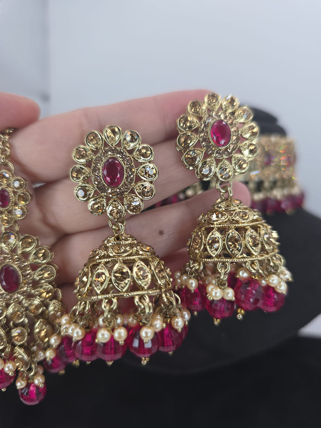 Hot pink choker set with jhumka earings and tikka