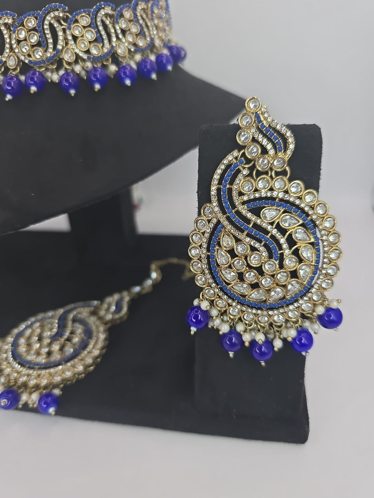 blue choker set with big earings and tikka