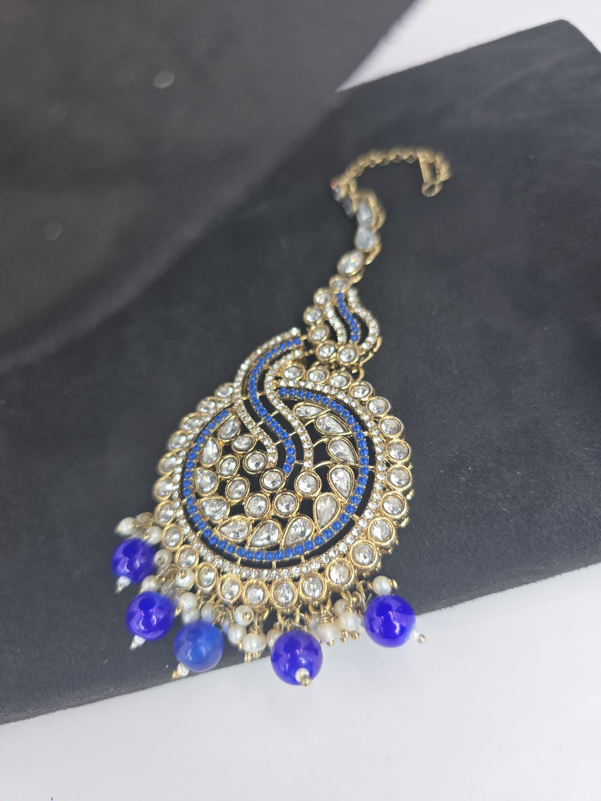blue choker set with big earings and tikka